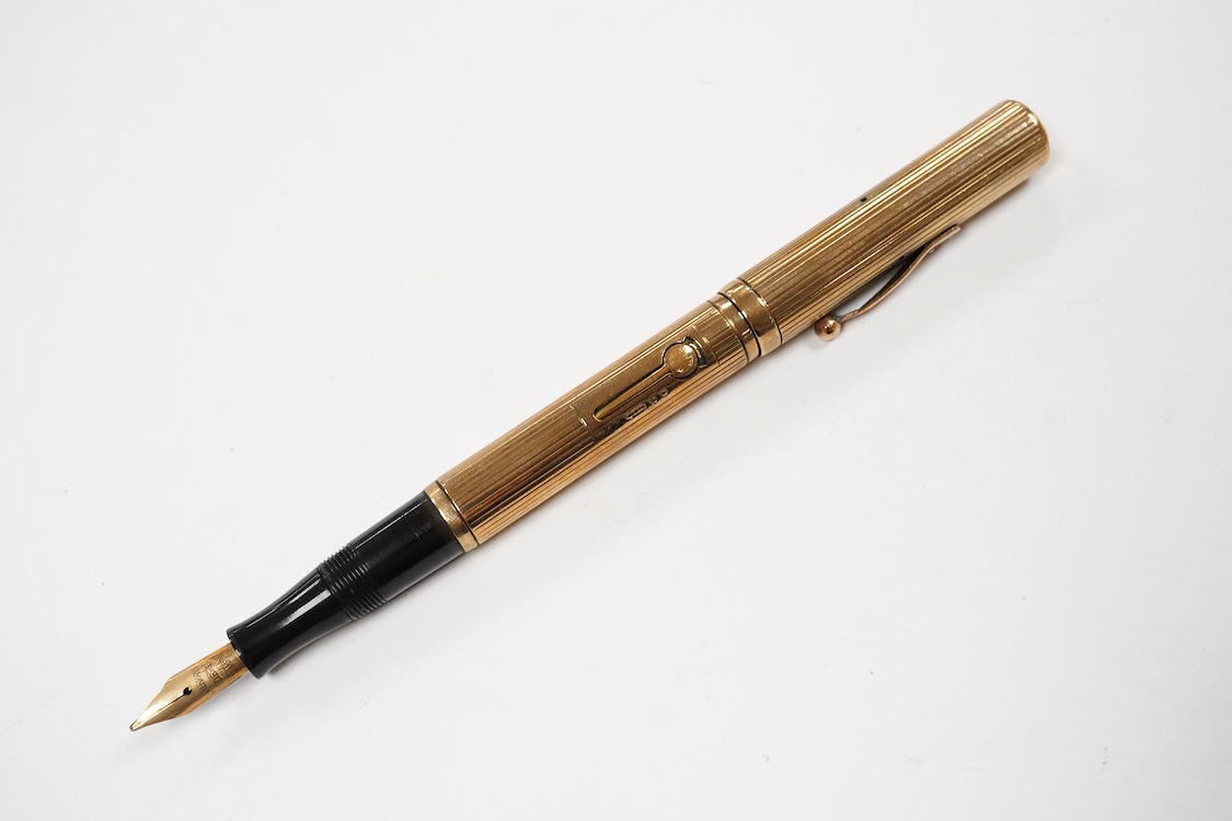 A Waterman FDW. 9ct. gold lined pattern fountain pen fitted with No.2 Waterman nib - good condition other than initials removed from cartouche